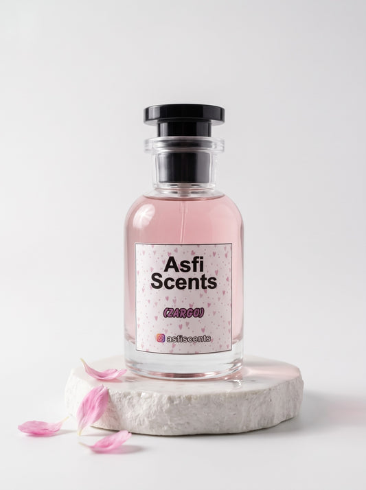 Zargo by Asfi Scents on a stone pedestal with pink petals