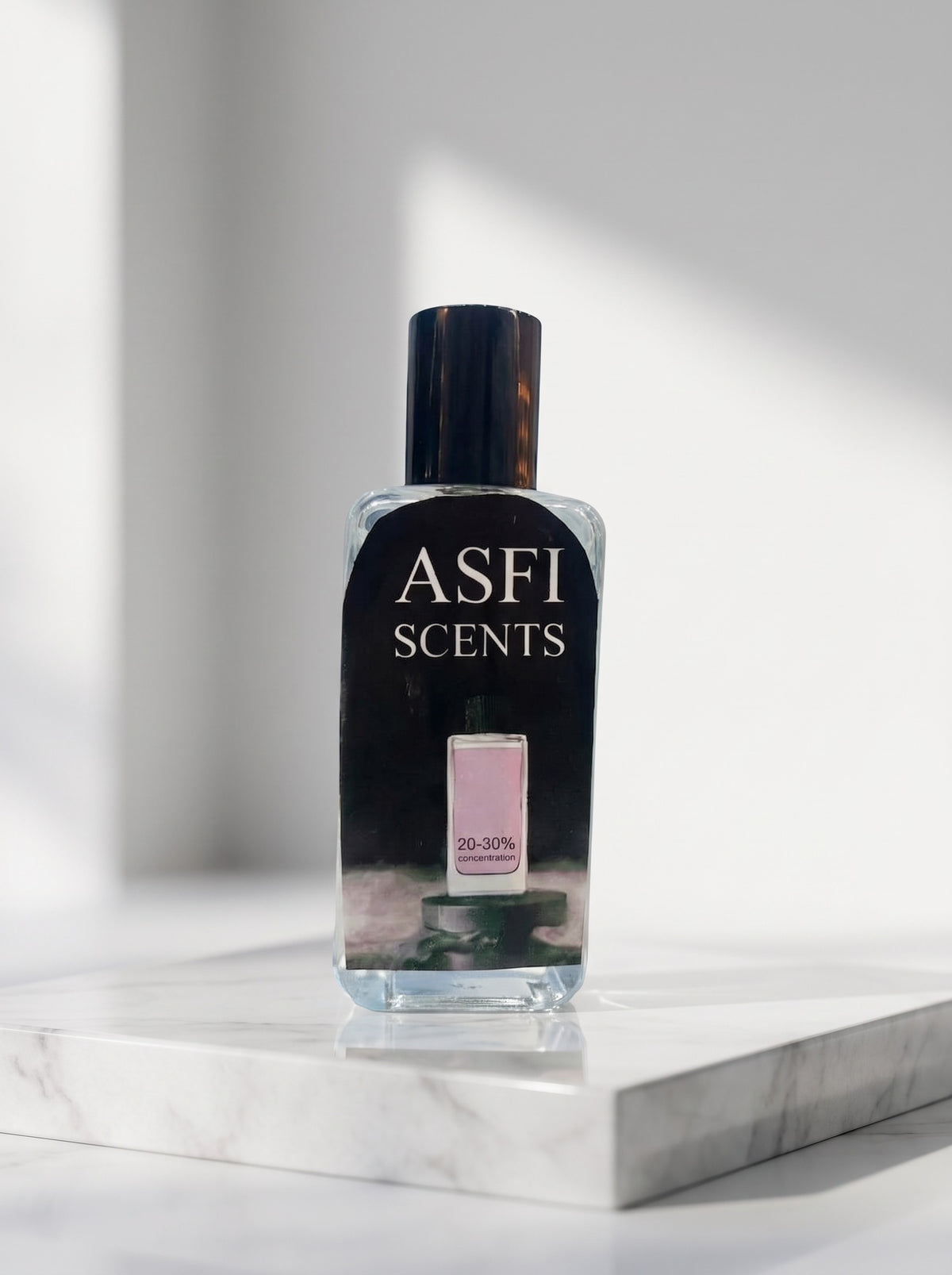 Signature by Asfi Scents on a marble block